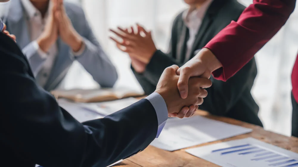Team of lawyers and tax auditors brainstorming together and calculating the balance sheet and historical financial accounts of the company and shareholders