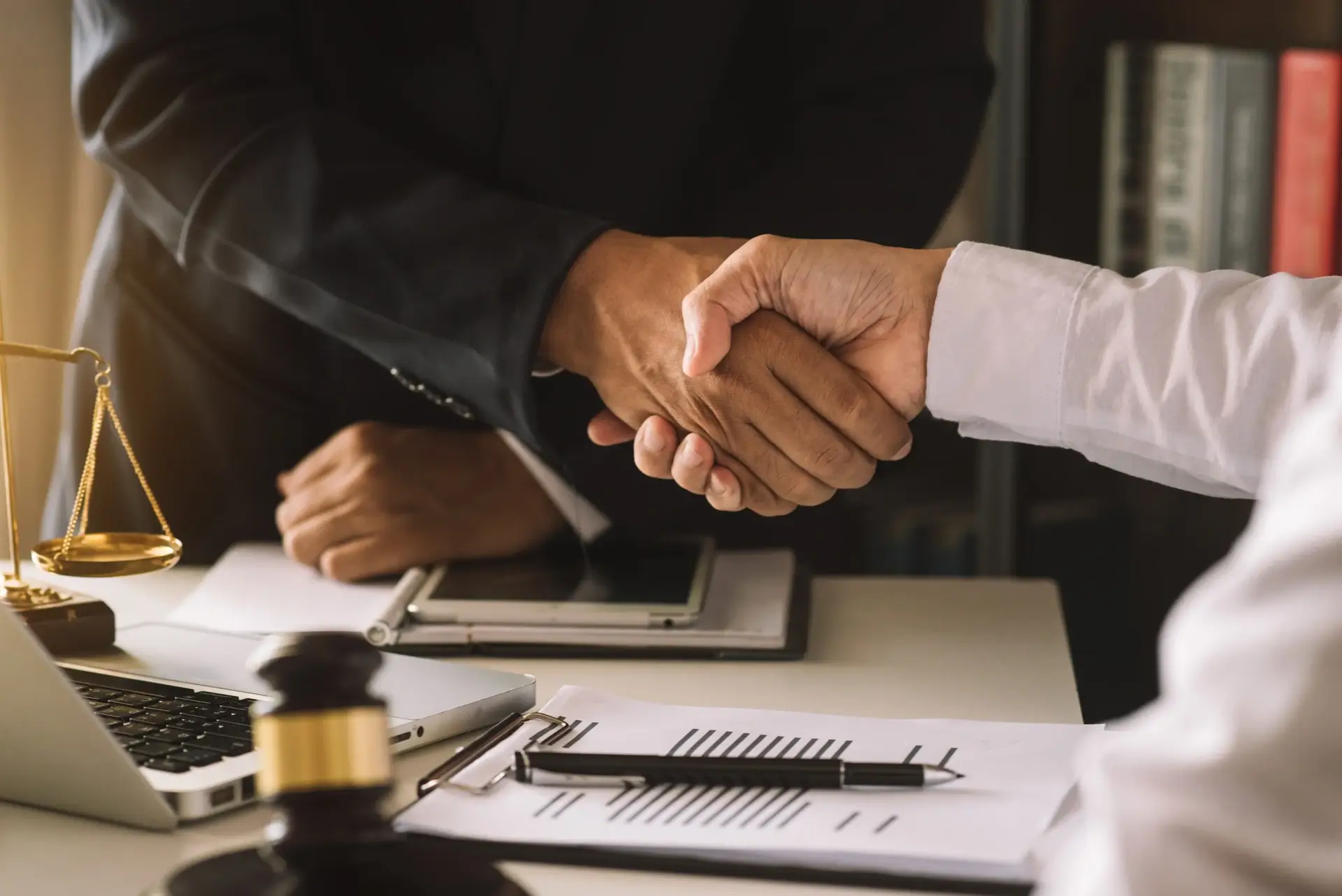 business people and lawyers discussing contract