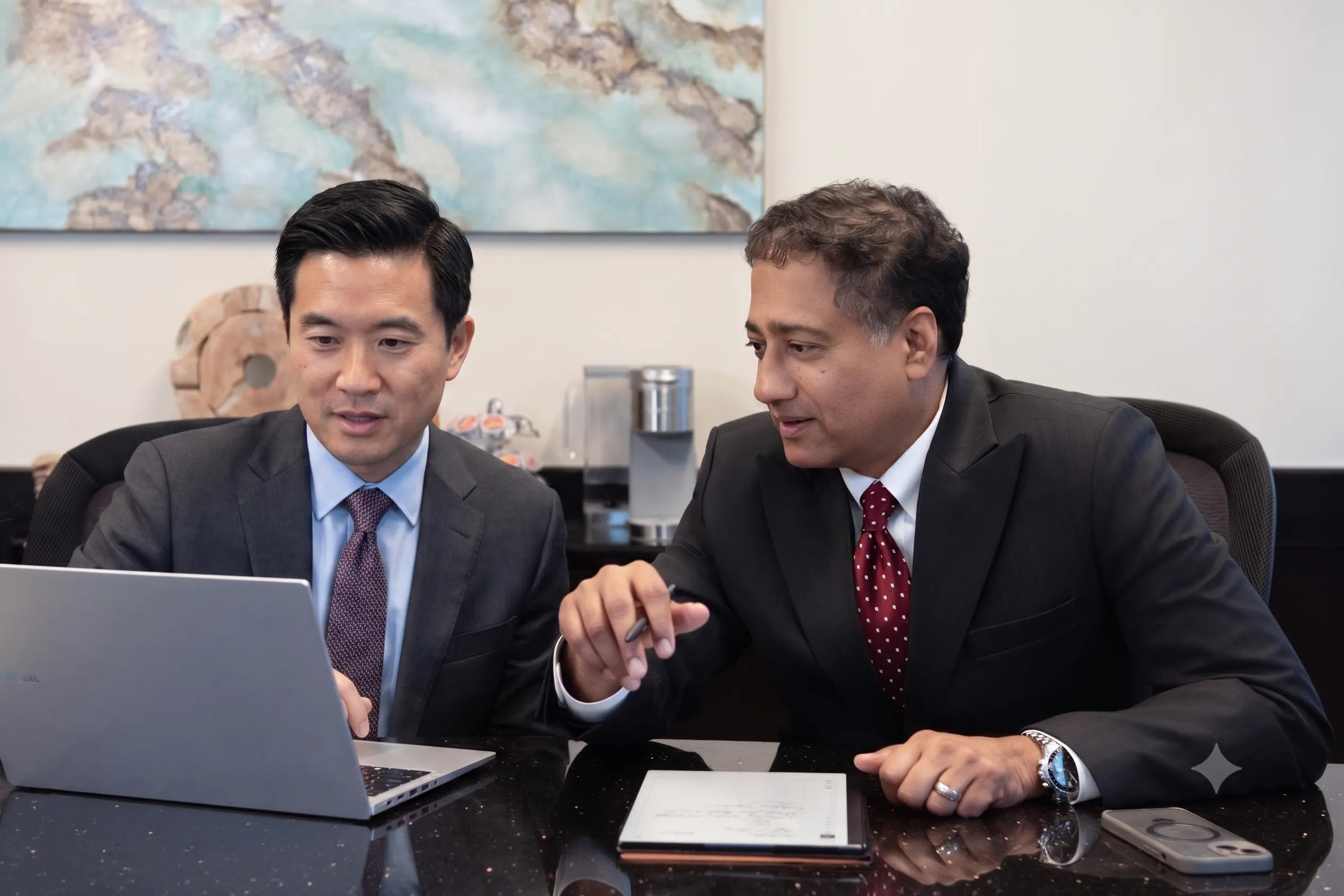 Charles Vethan and client at Vethan Law Firm