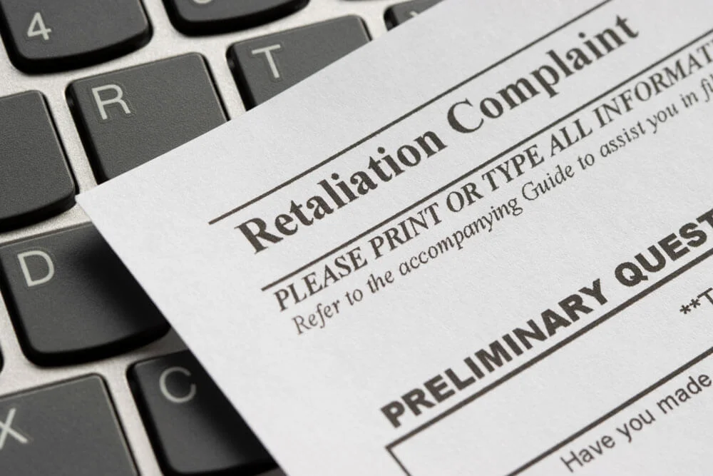 Closeup of a workplace retaliation complaint form.