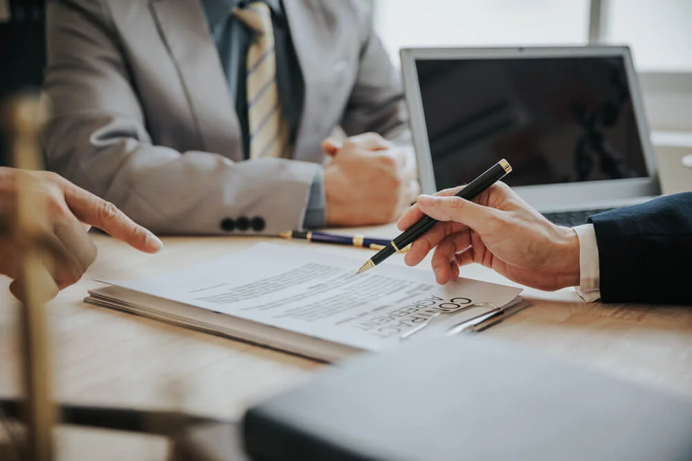 Businessmen and lawyers discuss contract documents. sign a business contract.