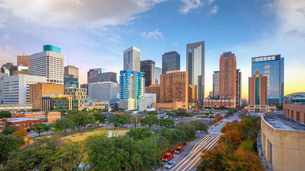 Houston, Texas, USA downtown park and skyline in the morning.